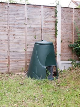 a green compost bin outside in garden; Essex; UK