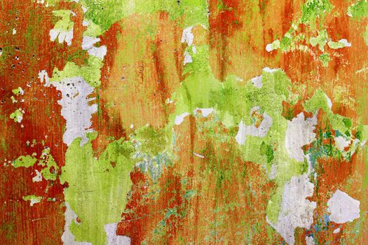 Red and green wall before repair. Rough housework wallpaper design backdrop. Color room interior decoration texture template background