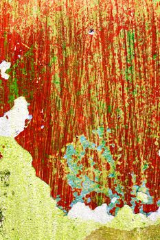 Red and green vertical wall before repair. Rough housework wallpaper design backdrop. Color room interior decoration texture template background