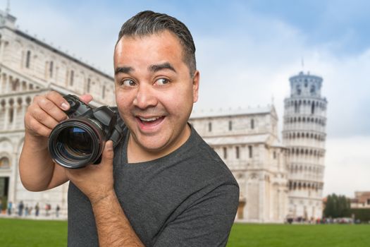 Hispanic Male Photographer With Camera at Leaning Tower of Pisa.