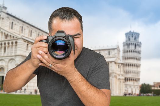 Hispanic Male Photographer With Camera at Leaning Tower of Pisa.