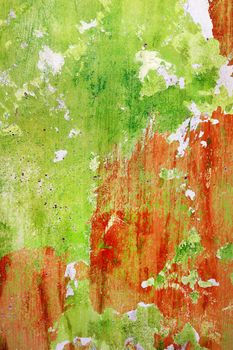 Red and green wall background. Rough housework wallpaper design backdrop. Color room vertical interior decoration texture template