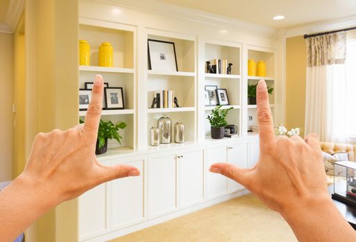 Hands Framing Custom Built-in Shelves and Cabinets Wall Design Inside Home.