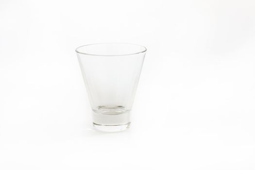 Empty glass for water, juice or milk on white background.