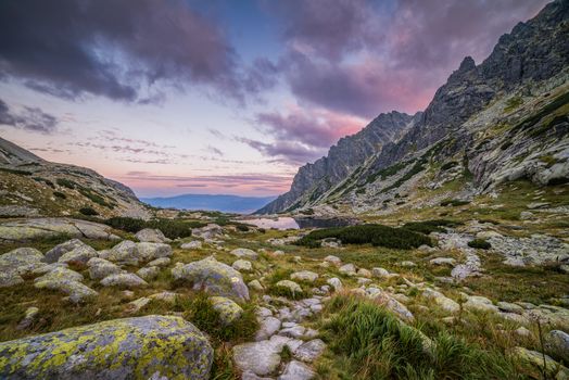 Mountain Landscape with a Tarn and Rocks in the Evening. Mlynicka Valley, High Tatra, Slovakia.