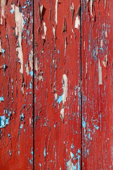 Old wood board painted red, background texture