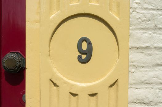House number  nine (9)