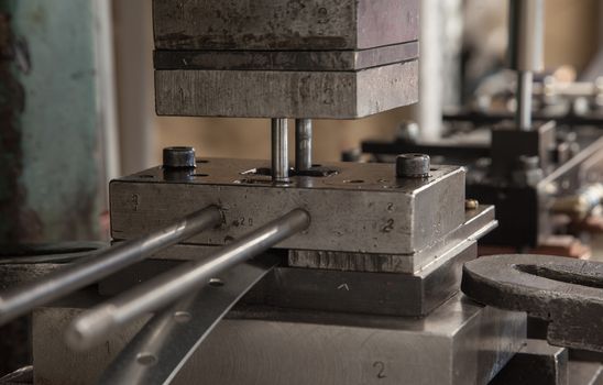 Close-up of an old punching hydraulic press.