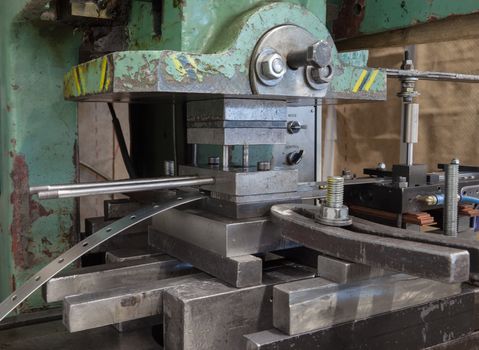 Close-up of an old punching hydraulic press.