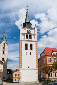 White bell tower in the historical centre of Vimperk, Southern Bohemia, Czech Republic