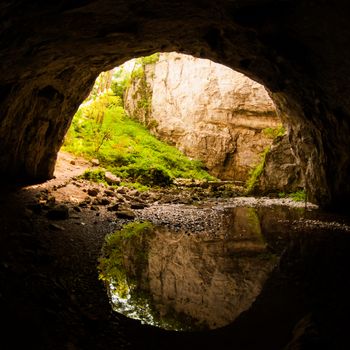 View through natural tunnel in Rakov Skocjan Valley, Slovenia
