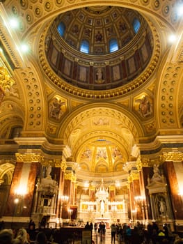 Indoor view of colorful picturesque dome ceiling in Saint Stephen's Basilica, Budapest, Hungary, Europe. UNESCO World Heritage Site.