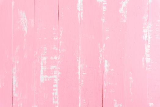 Pastel white and pink wooden table background texture.