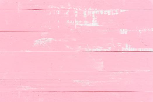 Pastel white and pink wooden table background texture.