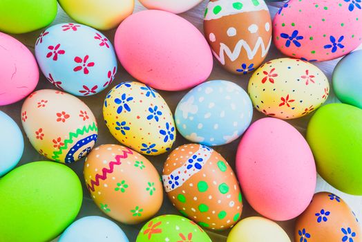 Happy easter!  Closeup Colorful Easter eggs background. Happy family preparing for Easter.