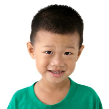Headshot of happy Asian child smiling. Portrait of young boy isolated on white background.