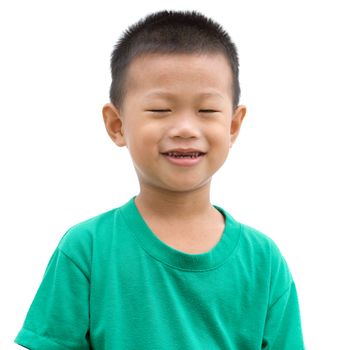 Headshot of happy Asian child smiling and closed eyes. Portrait of young boy isolated on white background.