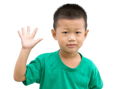Happy Asian child smiling and showing his palm. Portrait of young boy showing body parts isolated on white background.