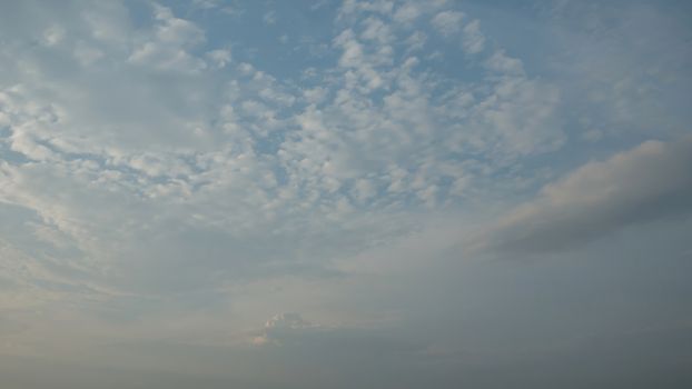 white clouds in the blue sky background