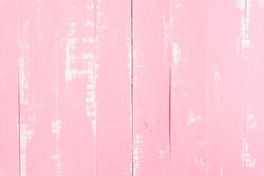 Pastel white and pink wooden table background texture.