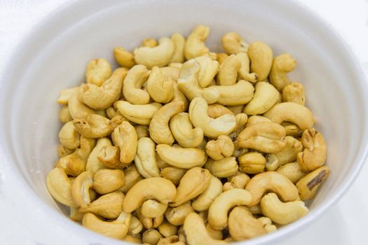 Cashews In a white container