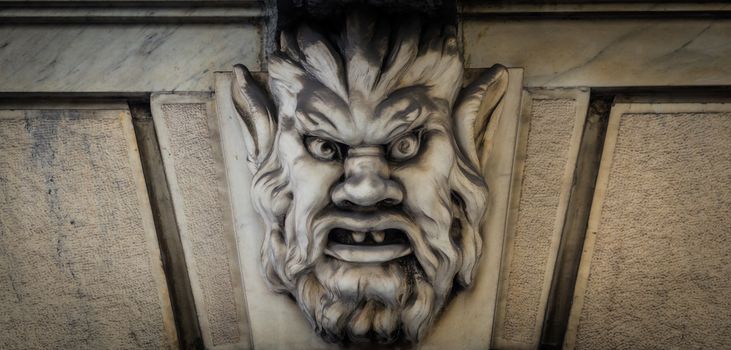 Italy, Turin. This city is famous to be a corner of two global magical triangles. This is a protective mask of stone on the top of a luxury palace entrance, dated around 1800