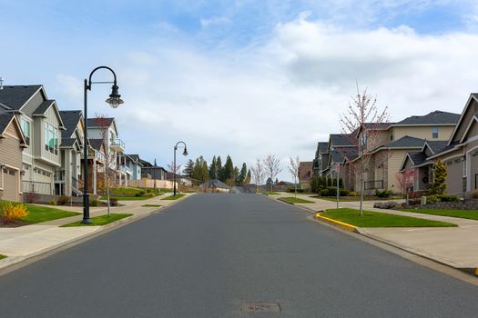 New North American suburban upscale neighborhood homes along street in Happy Valley Oregon United States