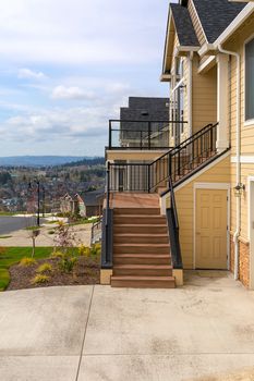 New home in suburban neighborhood front door entrance staircase