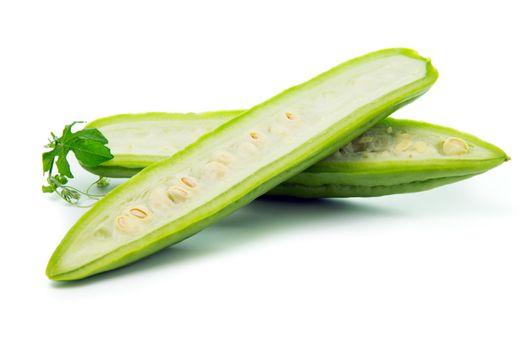 Green bitter gourd isolated on white with leaves