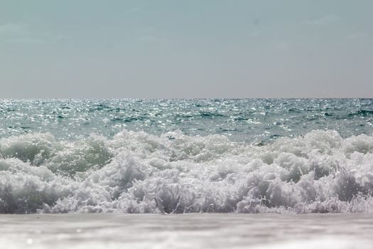 Soft wave of ocean on the sandy beach Antalya