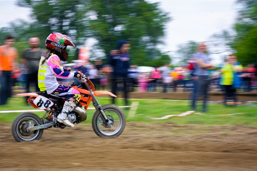 Uzhgorod, Ukraine - May 21, 2017: Extreme enduro MOTO SPORT Junior rider in the action. TransCarpathian regional Motocross Championship