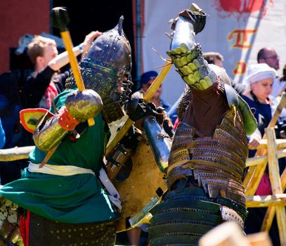 Chynadiyovo, Ukraine - May 27, 2017: medieval culture festival Silver Tatosh. Location St. Miklos Castle. Knight participants show their skills in fighting