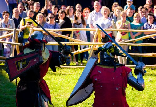 Chynadiyovo, Ukraine - May 27, 2017: medieval culture festival Silver Tatosh. Location St. Miklos Castle. Knight participants show their skills in fighting