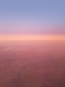 Dawn over California seen from the plane.