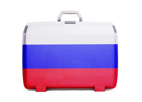 Used plastic suitcase with stains and scratches, printed with flag, Russia