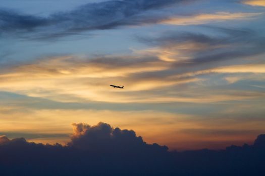 Plane with the evening sky