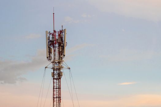 Mobile phone communication tower transmission  signal  leash in evening sky