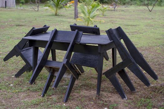Black chair table set in the garden.