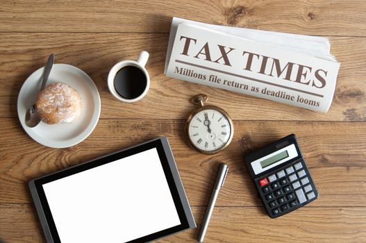 Tax times mock up newspaper with clock, calculator and blank tablet screen