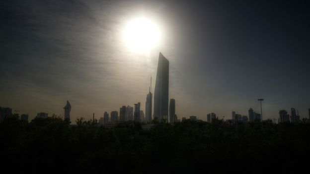 Cityscape of the Kuwait city under the sun in Kuwait