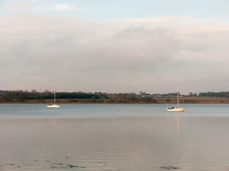 open ocean bay of water day sky sea coast no people boats fresh; essex; england; uk