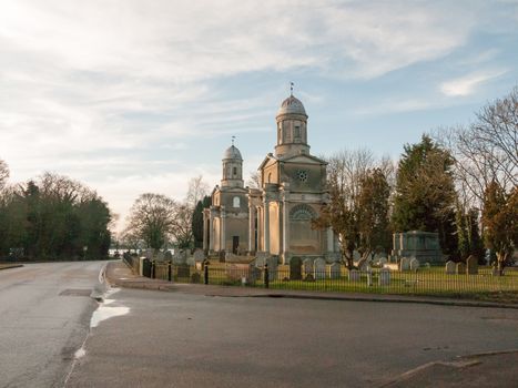 Mistley twin old church towers day road no people graveyard; essex; england; uk