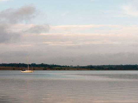 open ocean bay of water day sky sea coast no people boats fresh; essex; england; uk