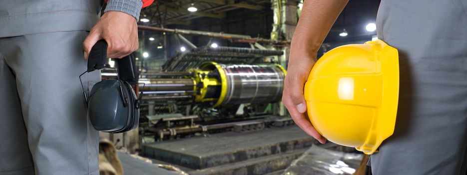 Closeup of workers in manufacturing plant