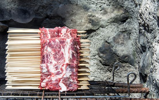 Fresh block of Arrosticini outdoor in a sunny day