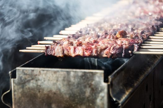 Arrosticini on the grill, Abruzzi skewers of sheep cooked on the grate and on a special brazier.