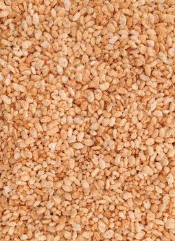 Crisped rice breakfast cereal as an abstract background texture