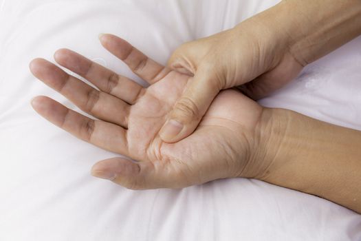 hand massage in the salon on a white background closeup