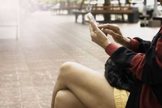 Woman using smartphone, personal chat, and social media