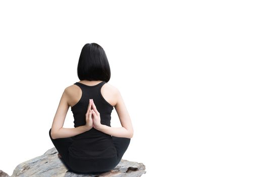 Close-up back of feminine and press the hands together and crossed legs during meditation isolated on white background.